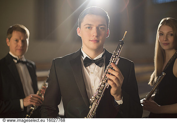 Portrait of confident classical musicians