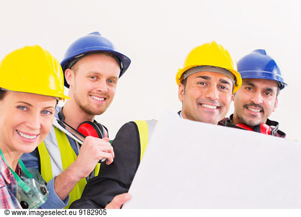 Portrait of confident construction workers