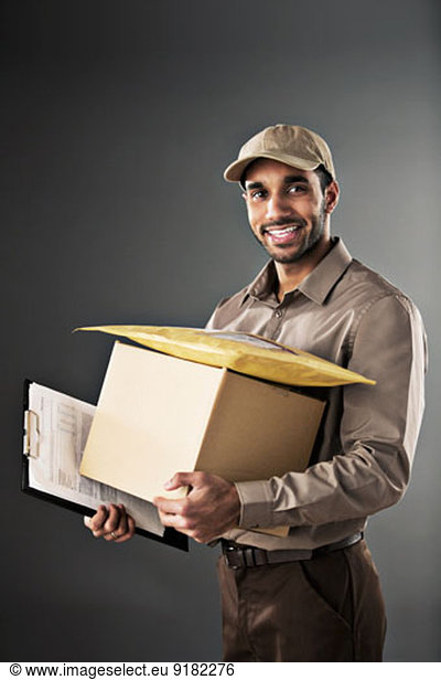 Portrait of confident deliveryman