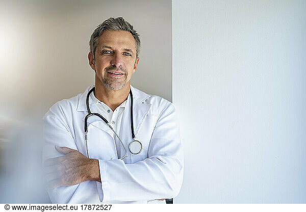 Portrait of confident doctor with arms crossed