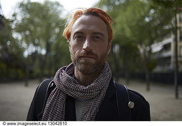 Portrait of confident man at park in Paris