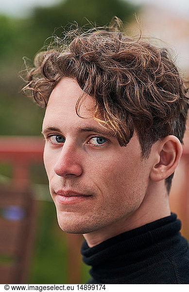 Portrait of confident man at party