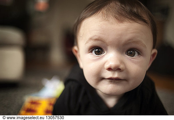 Portrait of cute baby boy at home
