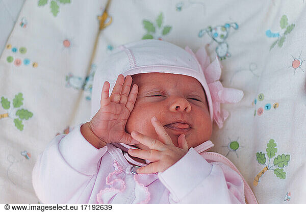 Portrait of cute newborn baby girl