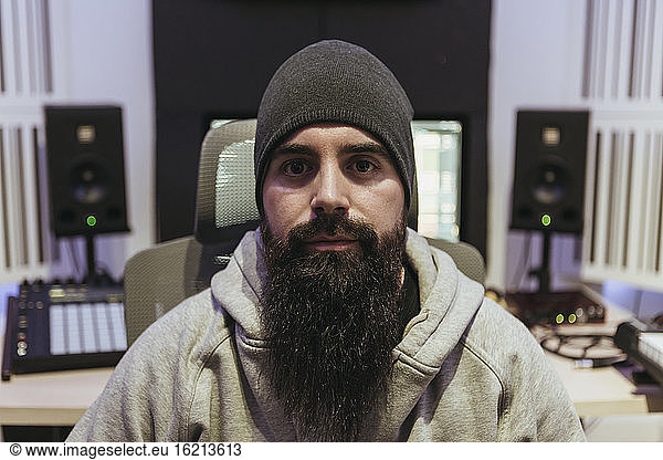 Portrait of DJ in his studio
