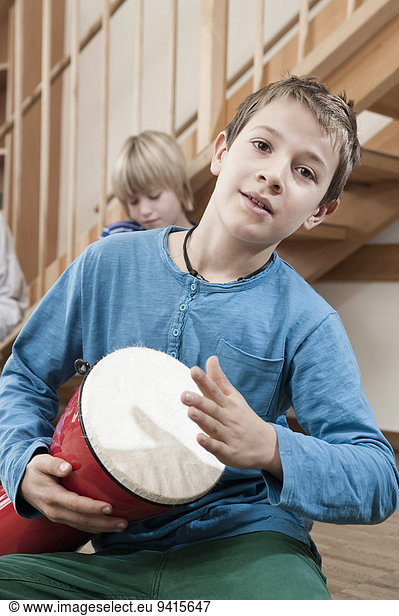 Portrait of drumming boy