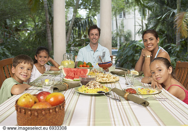 Portrait of Family at Dinner Table