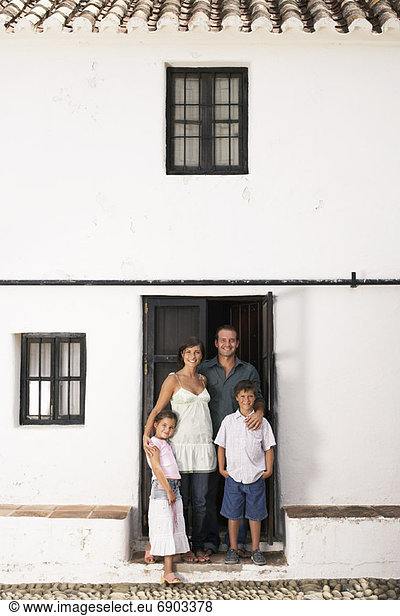Portrait of Family in Doorway