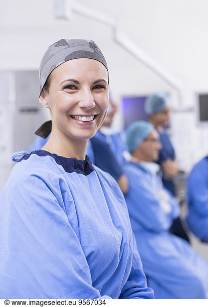 Portrait of female surgeon in operating theater