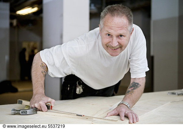 Portrait of happy carpenter