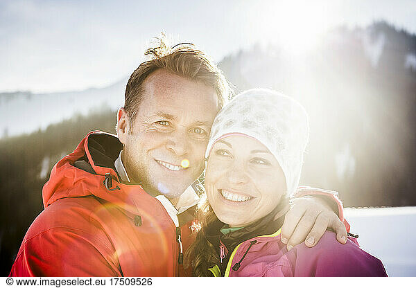 Portrait of happy couple in winter landscape  Achenkirch  Austria
