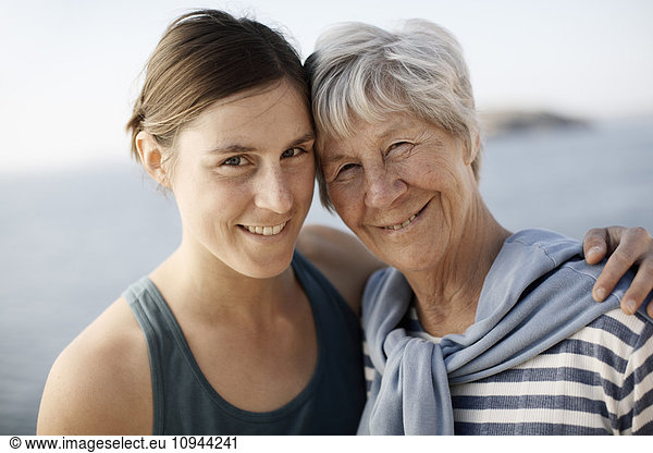 Portrait of happy mother with daughter