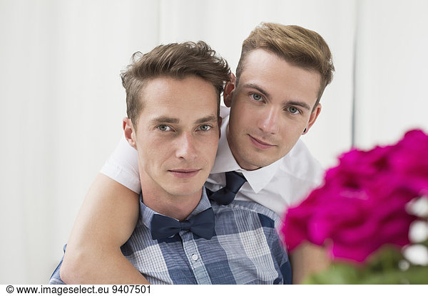 Portrait of homosexual couple  smiling