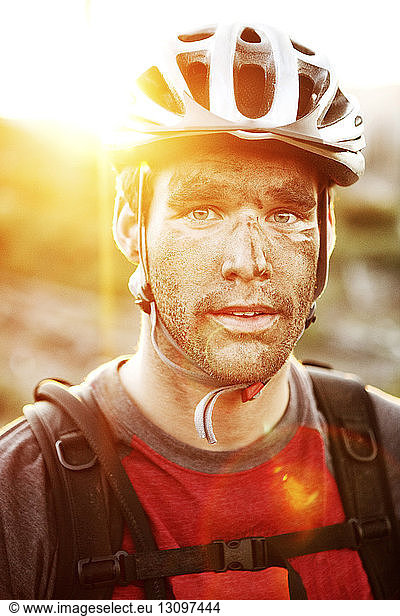 Portrait of male hiker wearing cycling helmet