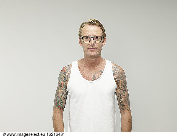 Portrait of mature man with tatoos