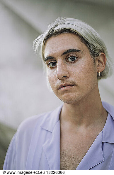 Portrait of non-binary person with medium-length hair