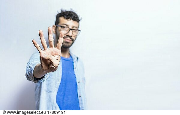 Portrait of people counting number four on isolated background. Person hand counting number four. Handsome guy hand showing number four