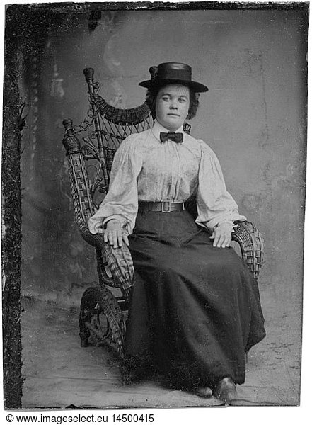 Portrait of Seated Adult Woman in Hat and Bow Tie  1870