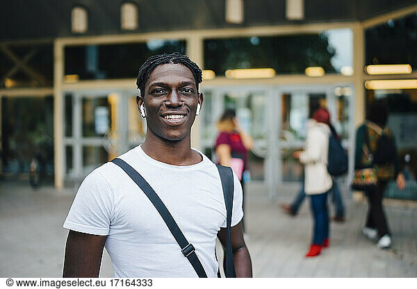 Portrait of smiling African student in campus