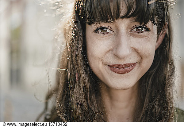 Portrait of smiling brunette woman