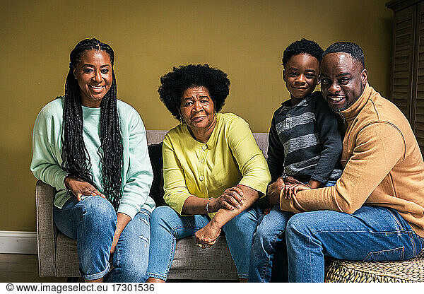 Portrait of smiling multi-generational family at home