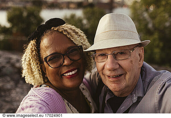 Portrait of smiling senior couple outdoors