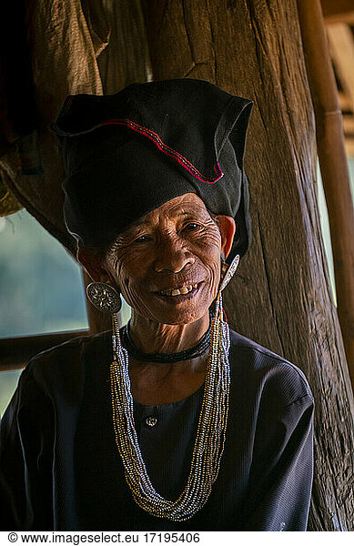 Portrait of smiling senior lady of Akhu tribe near Kengtung  Myanmar