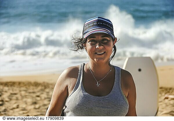 Portrait of smiling woman looking at the camera at the beach  Hawaii  USA  North America