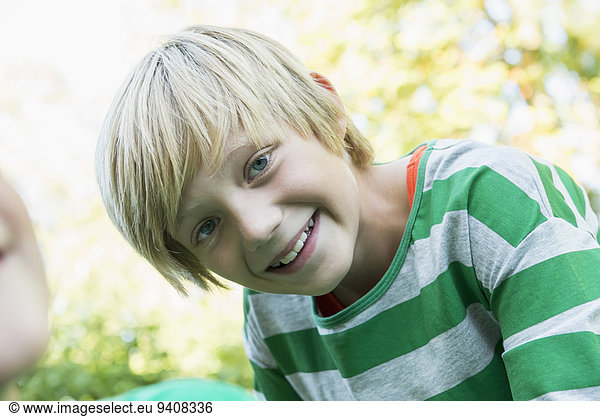 Portrait of smiling young boy  close-up