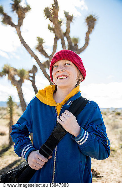 Portrait of tween smiling while out exploring Joshua Tree
