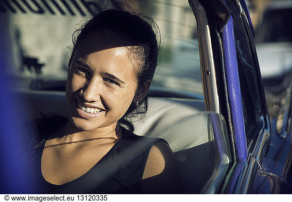 Portrait of woman travelling in car