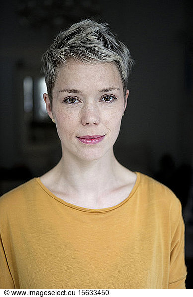 Portrait of woman with dyed short hair