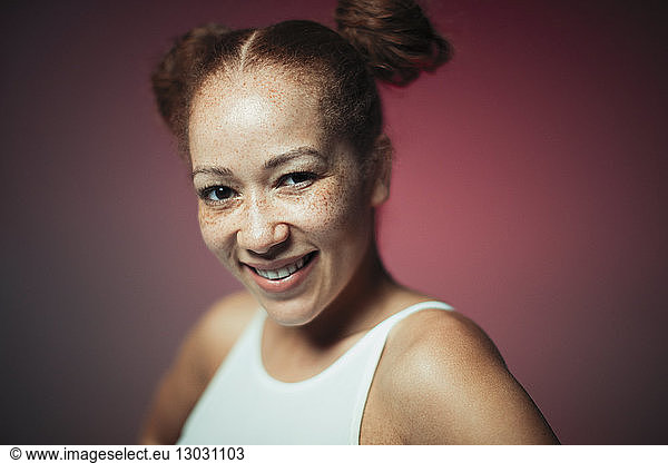 Portrait smiling  confident young woman with freckles