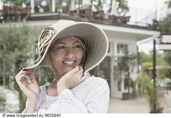 Portrait woman attractive smiling wearing hat