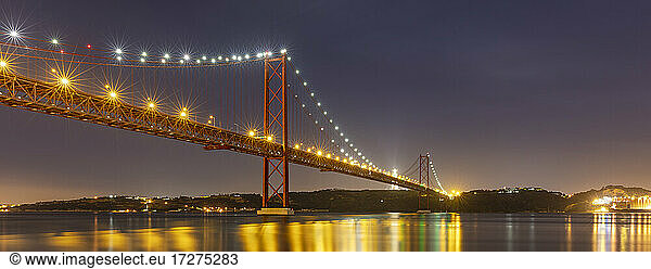 Portugal  Lisbon District  Lisbon  Panorama of 25 de Abril Bridge at dusk