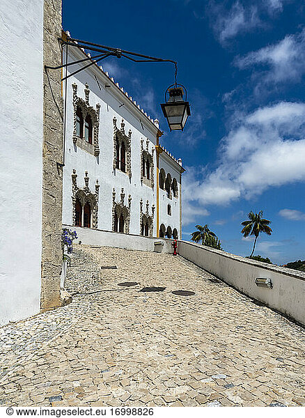 Portugal  Lisbon District  Sintra  Lantern hanging over cobblestone footpath of Sintra National Palace