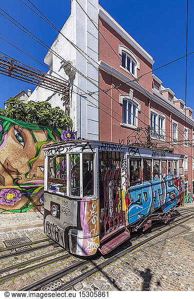 Portugal  Lisbon  Graffiti covered building and Gloria Funicular