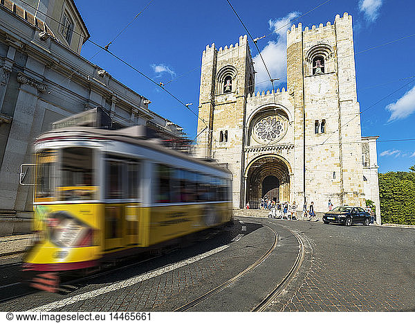 Portugal  Lisbon  yellow tram in front of Catedral Sé Patriarcal