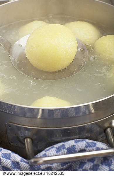 Potato dumpling on a skimmer  close-up