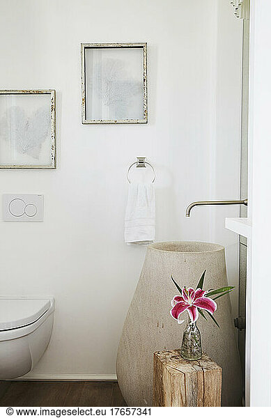 Powder room with pink lily