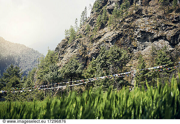 Prayer flags floating in the wind near Namche Bazaar