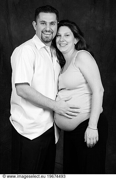 Pregnant mother with husband.