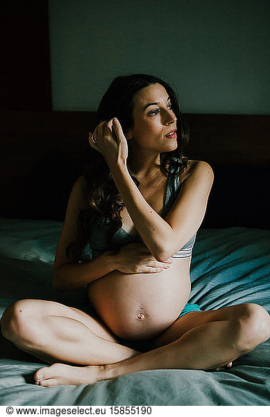 Pregnant Woman in bed