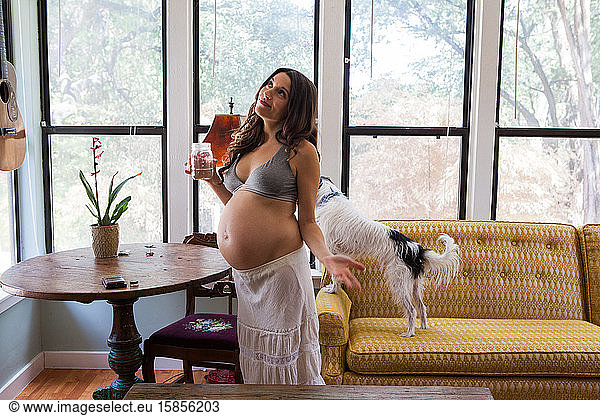 Pregnant woman with her dog