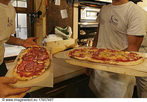 Preparation of pizza  Restaurant L'Orto Etrusco  Bibbona  Maremma  Province of Livorno  Tuscany  Italy  Europe