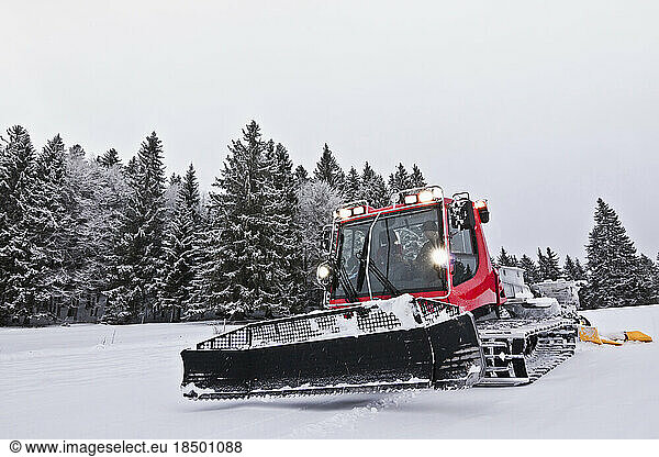 Preparing ski track with machine in the black forest  Feldberg  Baden Württemberg  Germany