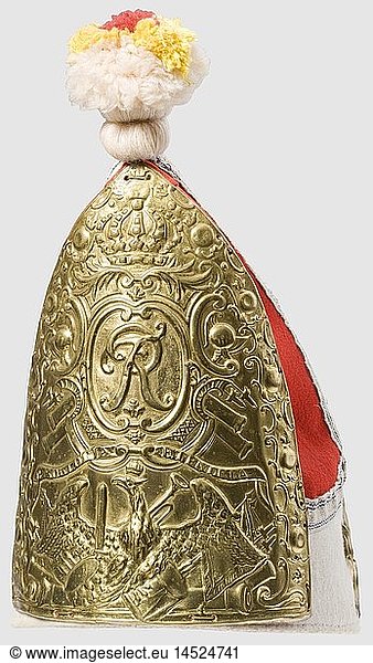 PREUSSEN INFANTERIE  GrenadiermÃ¼tze  des Infanterie-Regiments Nr. 25 von Kalckstein. GeprÃ¤gtes Messingblech  Vorderschild  hinteres TrophÃ¤enschild und seitliche Flammen. Die textilen Teile und das Lederfutter authentisch ergÃ¤nzt. Die Blechteile wahrscheinlich aus dem Kasseler Fundus stammend  jedoch nicht zeitgenÃ¶ssisch. Der GrenadiermÃ¼tze liegt eine Expertise fÃ¼r die Metallteile des Deutschen Historischen Museums von Klaus-Peter Merta bei  die im Gegensatz zu unserer Auffassung die Metallteile als zeitgenÃ¶ssisch ausweist
