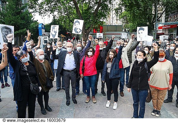Protestors wearing face masks hold a placard during a rally on the occasion of the Seven anniversary of Gezi Protest's in Ankara  Turkey  on June 01  2020.