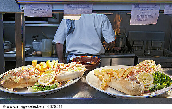 pub food ready to be served in commercial kitchen at British pub