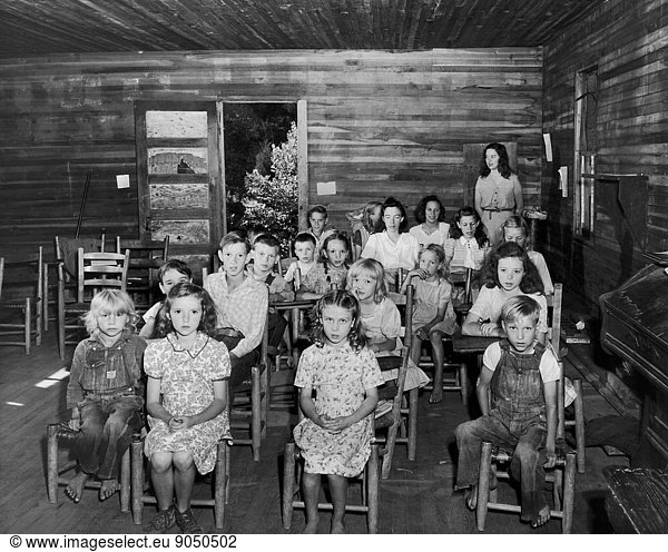 Pupils and teacher in one-room schoolhouse  Kentucky